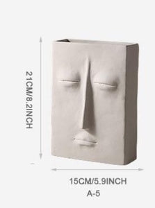 FACE SCULPTURE VASES