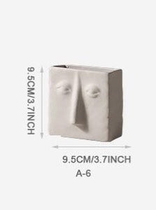 FACE SCULPTURE VASES
